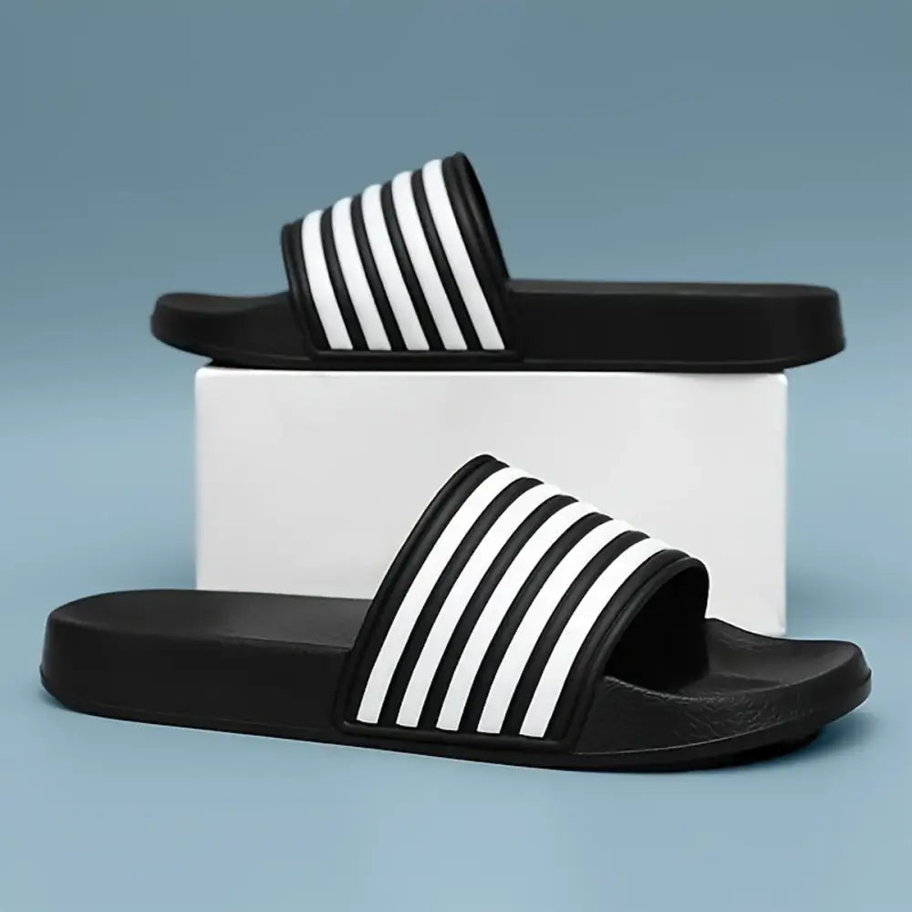 Imagem de chinelo masculino micro expandido tabela em atacado com textura listrada preto e branco