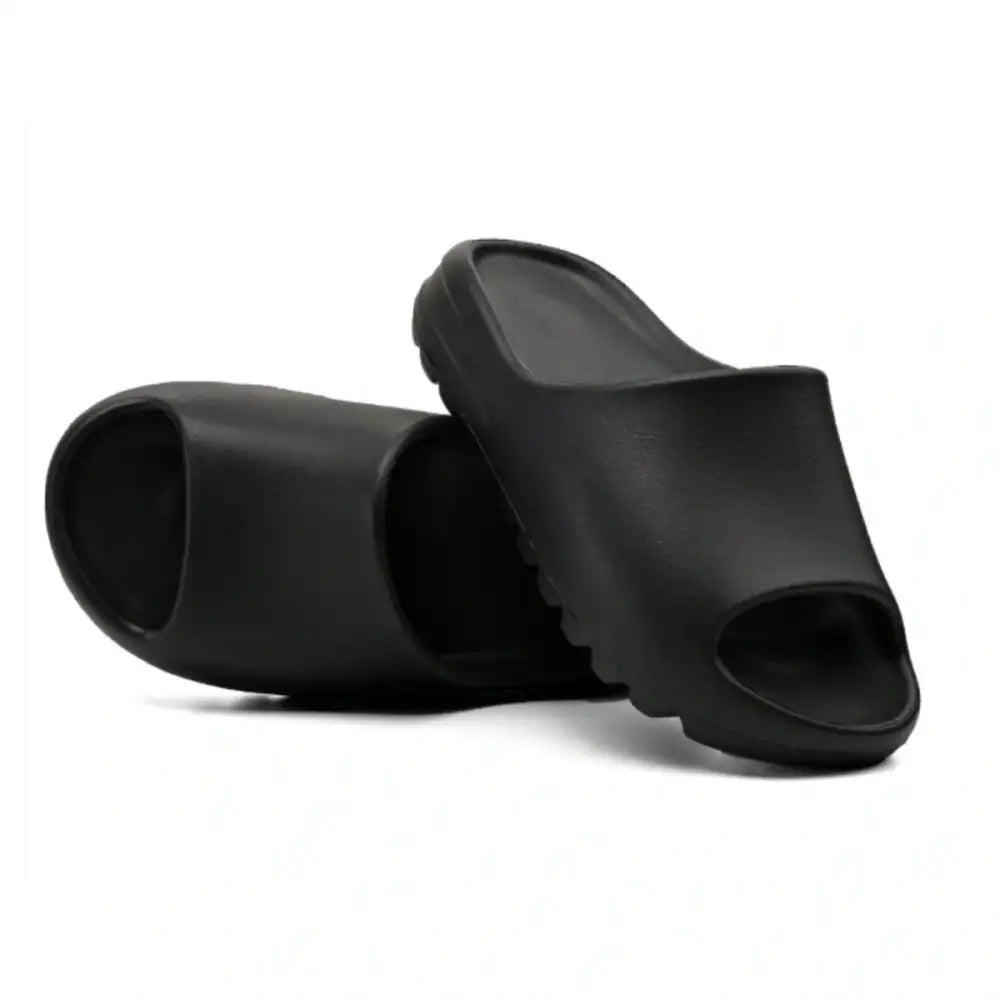 Imagem de chinelo slide liso casual preto, conforto e estilo do Chinelo Slide Liso