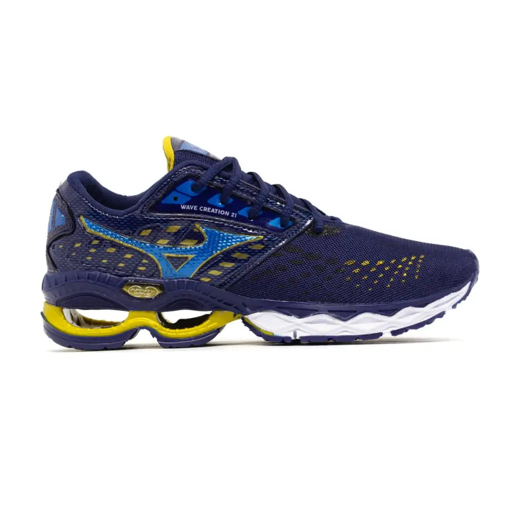 Imagem de tênis Mizuno Wave Creation 21 com design navy e amarelo, foco em wave creation