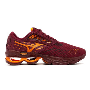 Imagem de tênis Mizuno Wave Creation 21 em marrom e laranja para equilíbrio e energia